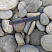 Kamenclub.ru: Галька речная плоская (серо-белая) фр. 70-120 мм. купить  в Смоленске галька галечник речной серый, белый окатанная плоская  природная галька 9000 руб/т   фото КАМЕНЬ КЛУБ